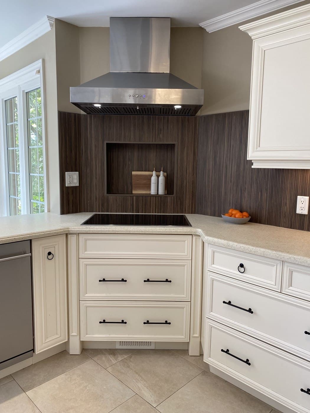 A finished walnut feature-wall kitchen renovation in Burlington, Ontario